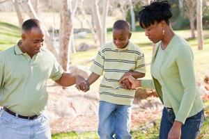 Beautiful African American Family Playing Outside photo