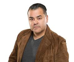 Handsome Young Hispanic Male Headshot Portrait Against White Background. photo