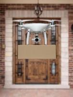 Unmanned Aircraft System UAV Quadcopter Drone Delivering Package To House photo