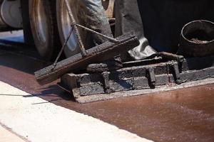 Road Worker Resurfacing Street photo