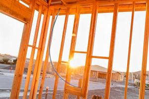 View of Sunset From Inside New Home Construction Site photo