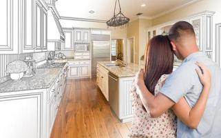 Young Military Couple Inside Custom Kitchen and Design Drawing Combination photo