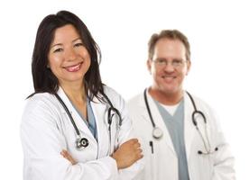 Hispanic Female Doctor and Male Colleague Behind photo