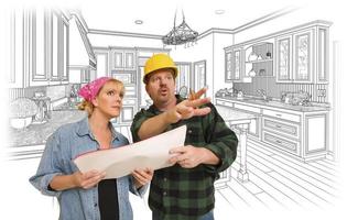 Contractor Talking with Customer Over Kitchen Drawing photo