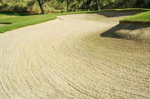 Abstract of Golf Course and Sand Bunker. photo