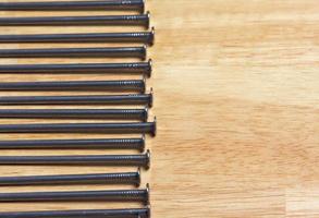 Macro of Nails on Wood photo