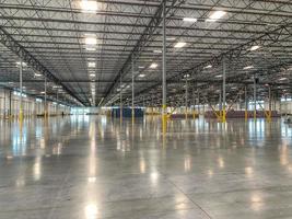 Massive Empty Industrial Warehouse Interior photo