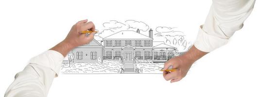 Male Hands Sketching A Beautiful House photo