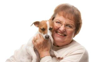 Happy Attractive Senior Woman with Puppy photo
