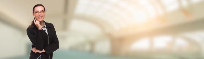 Mixed Race Businesswoman Inside Building Banner photo