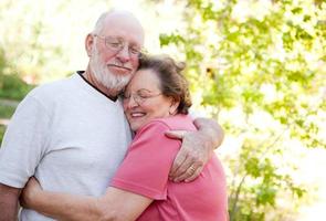 Loving Senior Couple Outdoors photo