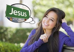 Young Woman with Thought Bubble of Jesus Green Road Sign photo