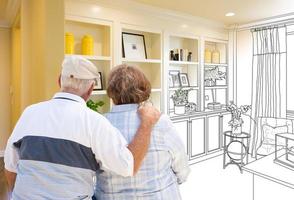 Senior Couple Facing Custom Built-in Shelves and Cabinets Design Drawing Gradating to Finished Photo