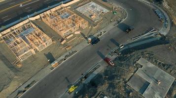 Drone Aerial View of Home Construction Site Foundations and Framing photo