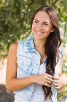 Attractive Smiling Mixed Race Girl Portrait Outdoors photo