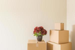 Variety of Packed Moving Boxes In Empty Room photo