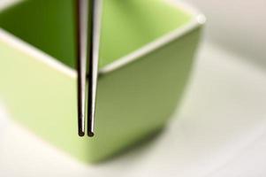 Chopsticks and Green Bowl photo