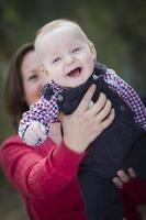 Little Baby Boy Having Fun With Mommy Outdoors photo