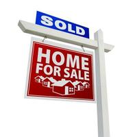 casa vendida azul y roja en venta signo de bienes raíces en blanco foto