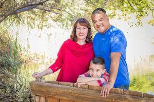 Mixed Race Caucasian and Hispanic Family At The Park. photo