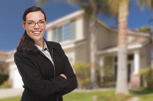 Mixed Race Woman in Front of Residential House photo