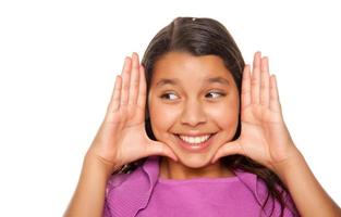 Pretty Hispanic Girl Framing Her Face with Hands photo