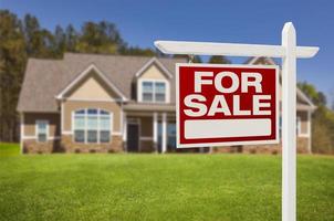 Home For Sale Sign in Front of New House photo