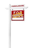Right Facing Foreclosure Sold For Sale Real Estate Sign Isolated on White. photo