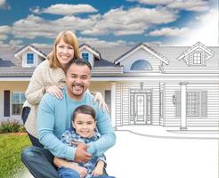 Mixed Race Hispanic and Caucasian Family In Front of Gradation of House Drawing and Photograph photo
