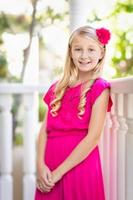 Cute Young Caucasian Girl Portrait On A Porch photo