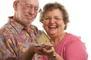 Happy Senior Couple and Home photo