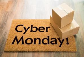 Cyber Monday Welcome Mat On Wood Floor With Shipment of Boxes photo