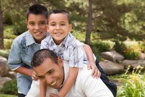 Father and Sons in the Park photo