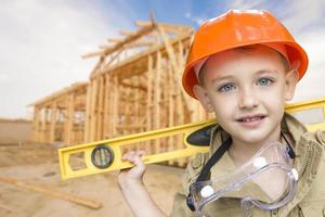 Child Boy Dressed Up as Handyman in Front of House Framing photo