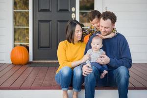 Young Mixed Race Chinese and Caucasian Family Portrait photo