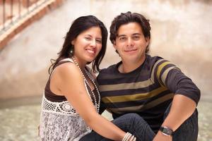 Happy Attractive Hispanic Couple At The Park photo