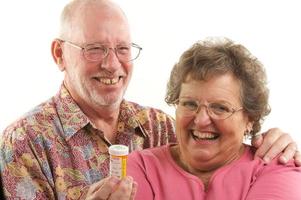 Senior Couple with Prescription Bottle photo