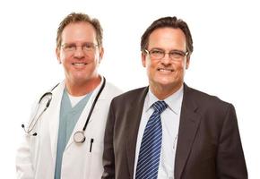 Smiling Businessman with Male Doctor or Nurse photo