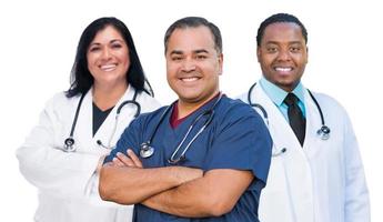 Group of Mixed Race Female and Male Doctors Isolated on White photo