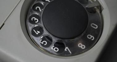 dialing on an old phone, call phone concept video