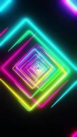 Flying through quadrilaterals painted with multicolored light. Vertical looped video