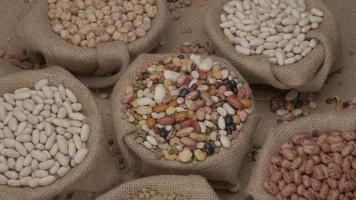 Mixed legumes dry beans rotating. Mediterranean diet, healthy nutrition, protein, vegan vegetarian ingredients video
