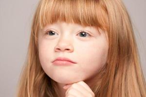 Portrait of an Adorable Red Haired Girl photo