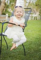 Cute Playful Baby Girl Portrait Outside at Park photo