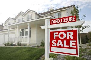 Foreclosure Home For Sale Sign and House photo