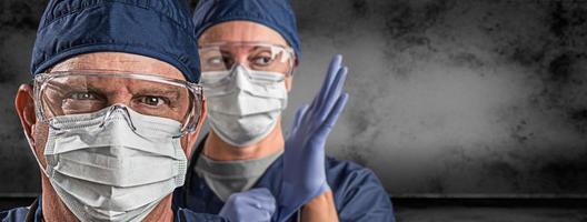 Female and Male Doctors or Nurses Wearing Scrubs and Protective Mask and Goggles Banner photo