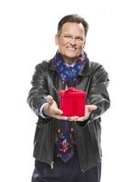 Man Wearing Black Leather Jacket Holding Christmas Gift on White photo