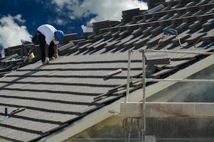 Roofer Laying Tile photo