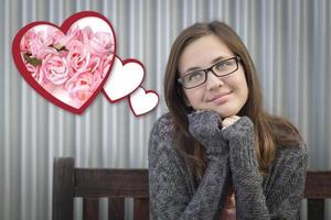 Daydreaming Girl Next To Floating Hearts with Pink Roses photo