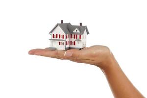 House in Female Hand on White photo